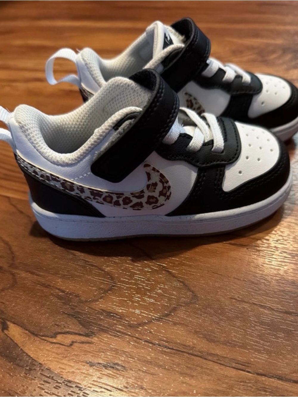 Nike Kids Black and White Sneakers with Leopard Swoosh